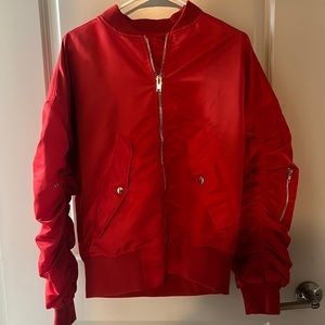 Bomber jacket with zipper design.